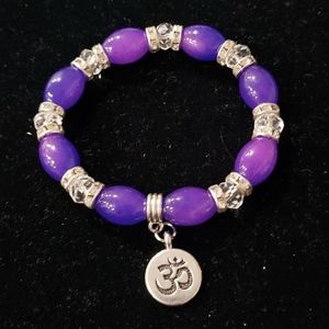 Purple and Clear Beaded Stretch Bracelet with OM Charm